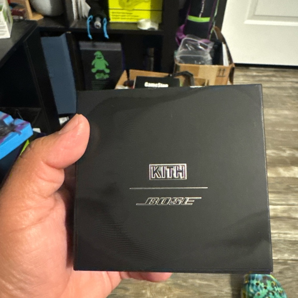 Limited edition kith Bose ultra open ear earbuds.